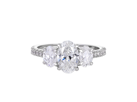 A.G oval cut trilogy with split bead diamond band.