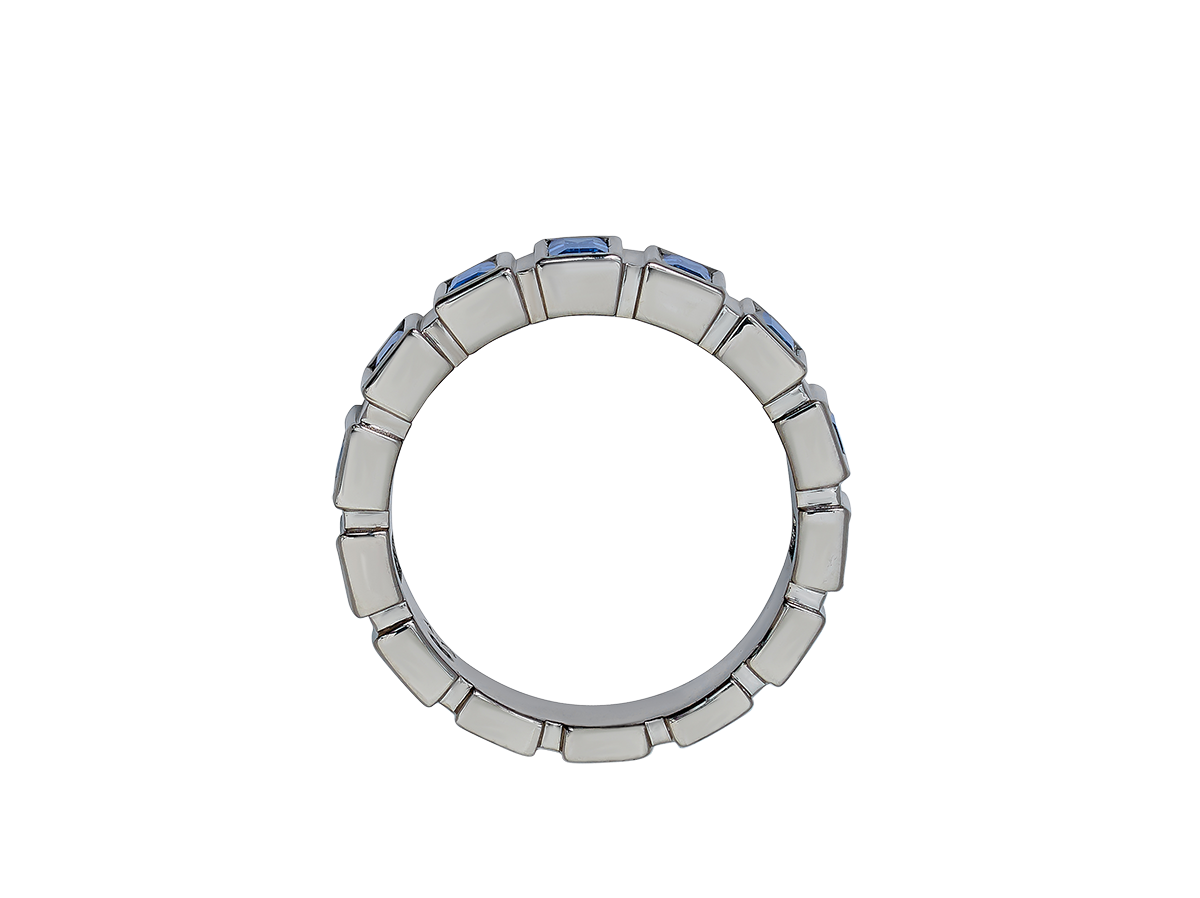 A.G Designer Jeweller custom made blue sapphire bezel set ring in white gold.
