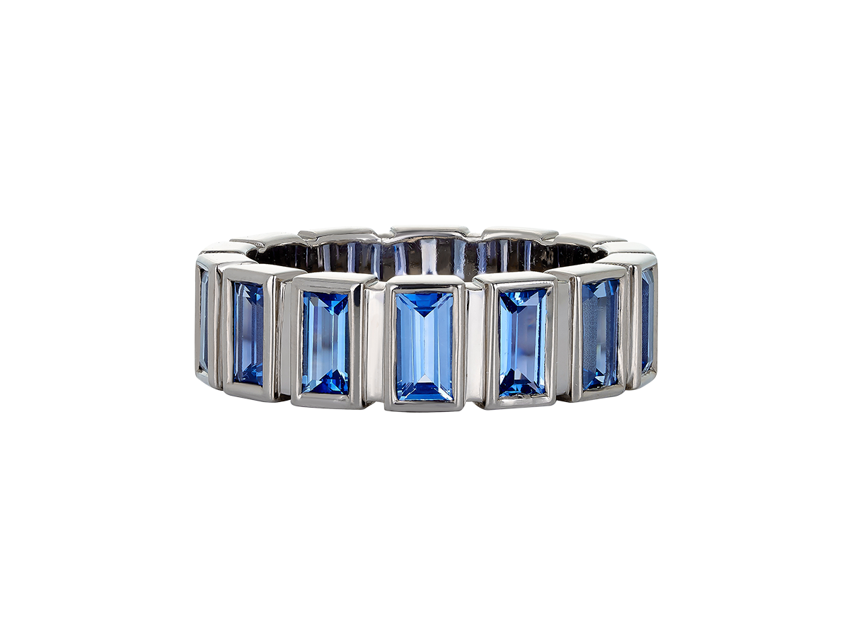 A.G Designer Jeweller custom made blue sapphire bezel set ring in white gold.