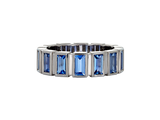 A.G Designer Jeweller custom made blue sapphire bezel set ring in white gold.