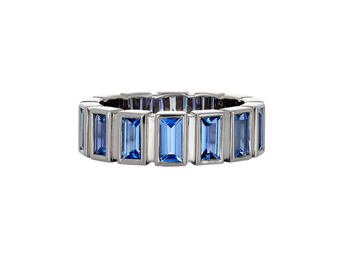 A.G Designer Jeweller custom made blue sapphire bezel set ring in white gold.