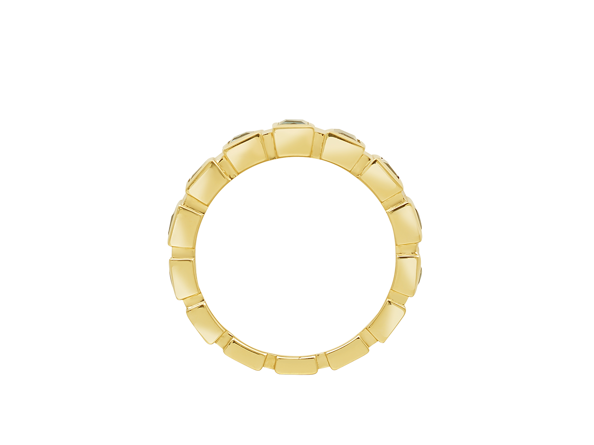Front view of A.G baguette cut bezel set eternity band with green sapphires and yellow gold.