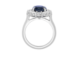 Side view of A.G oval cut Ceylon sapphire and diamond cluster ring