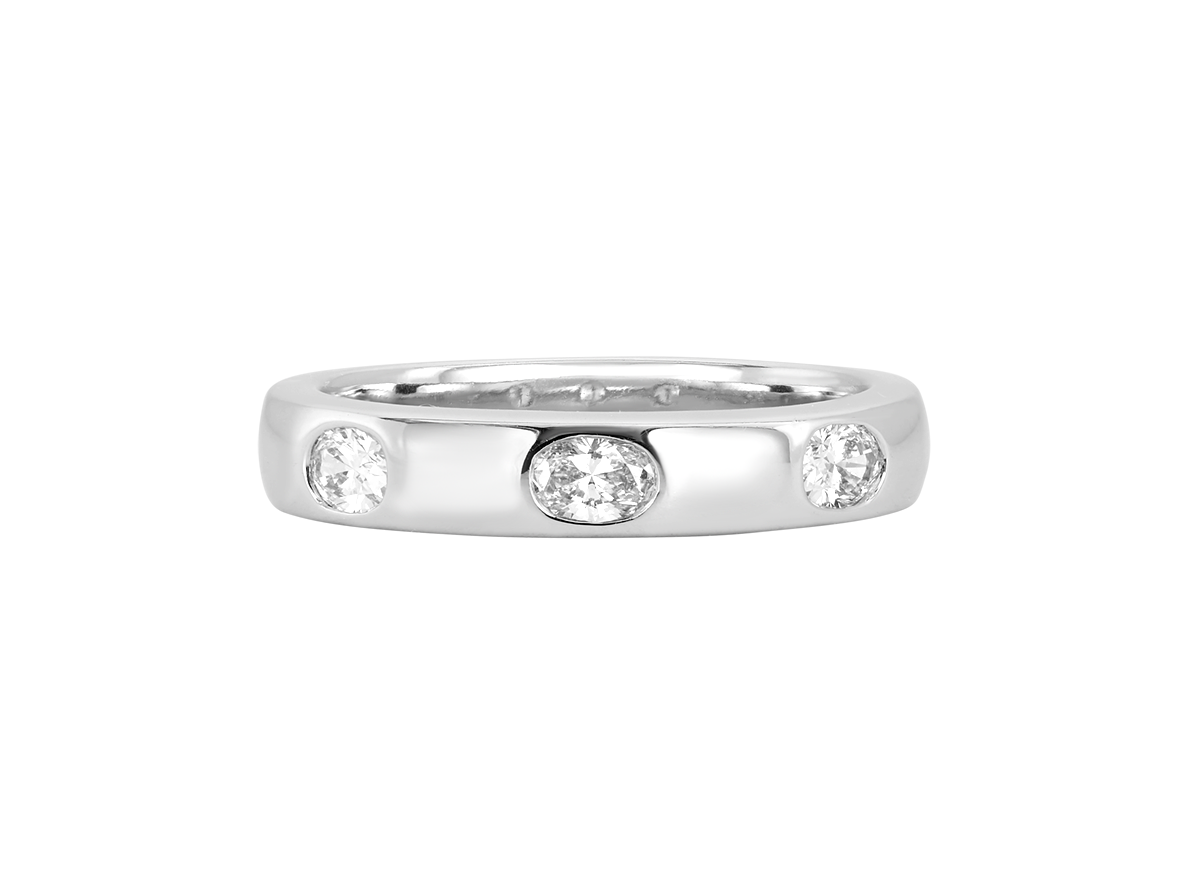 A.G Designer Jeweller signature custom designed hammer set oval cut diamond wedding ring.