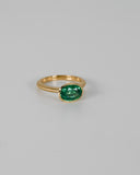 A.G 1.79ct oval cut Zambian emerald ring on white background