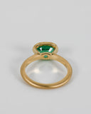 Back view of oval emerald ring.