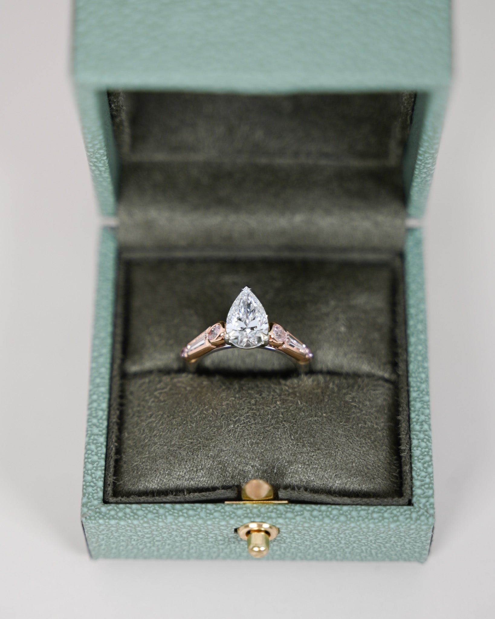 Pear Cut Diamond and Pink Diamond Ring