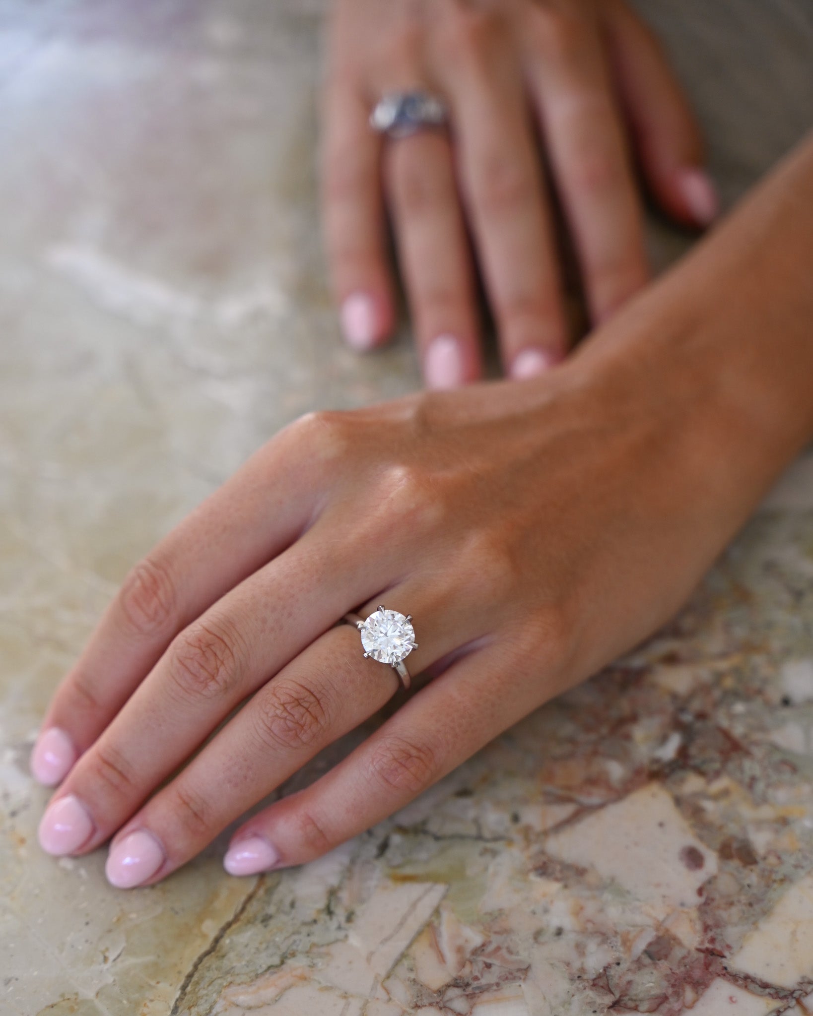 A close up photo of the 5.01 Round Brilliant Cut Diamond
