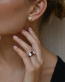 Close up view of a Radiant Cut Yellow Diamond Stud in a left ear