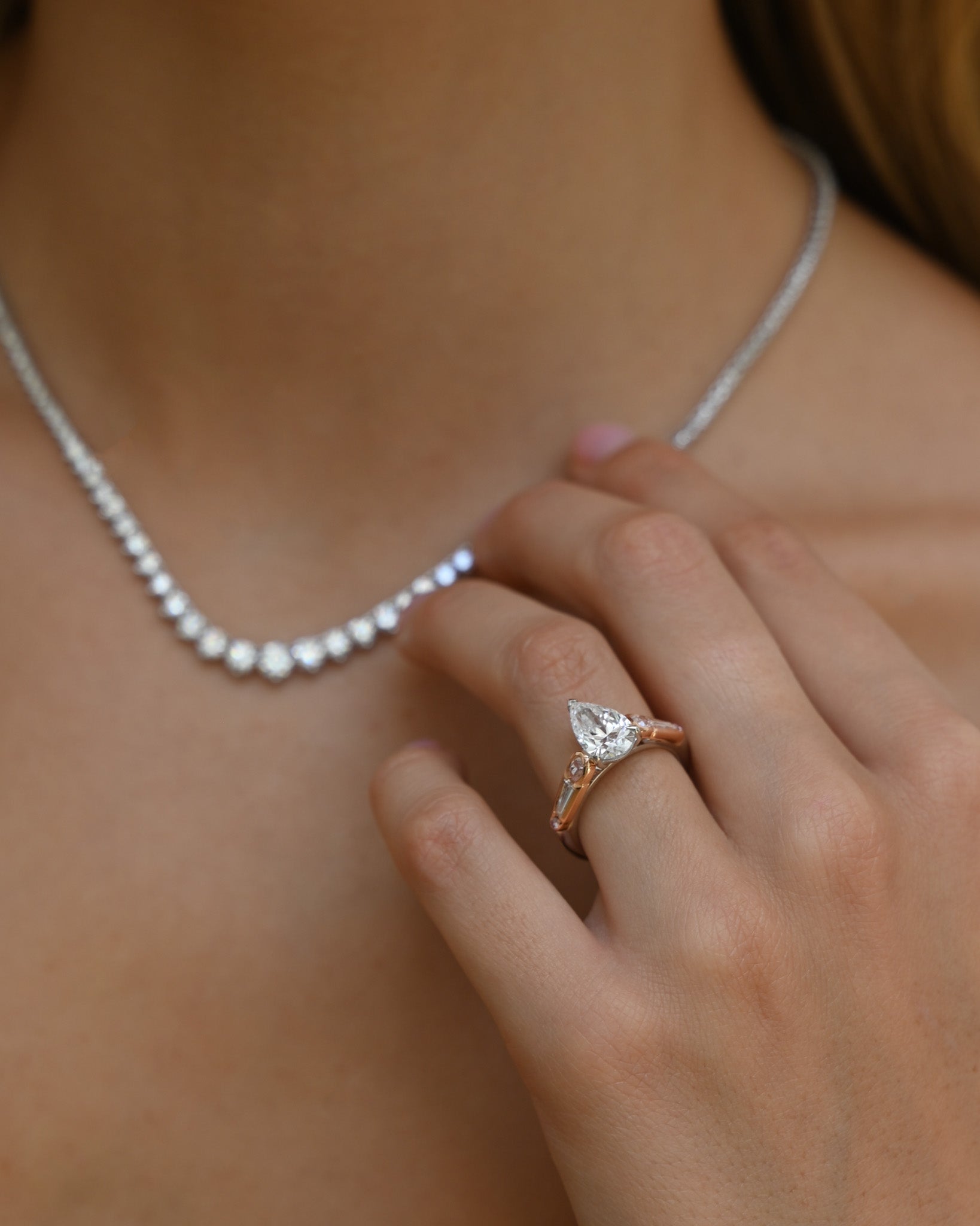 Pear Cut Diamond and Pink Diamond Ring