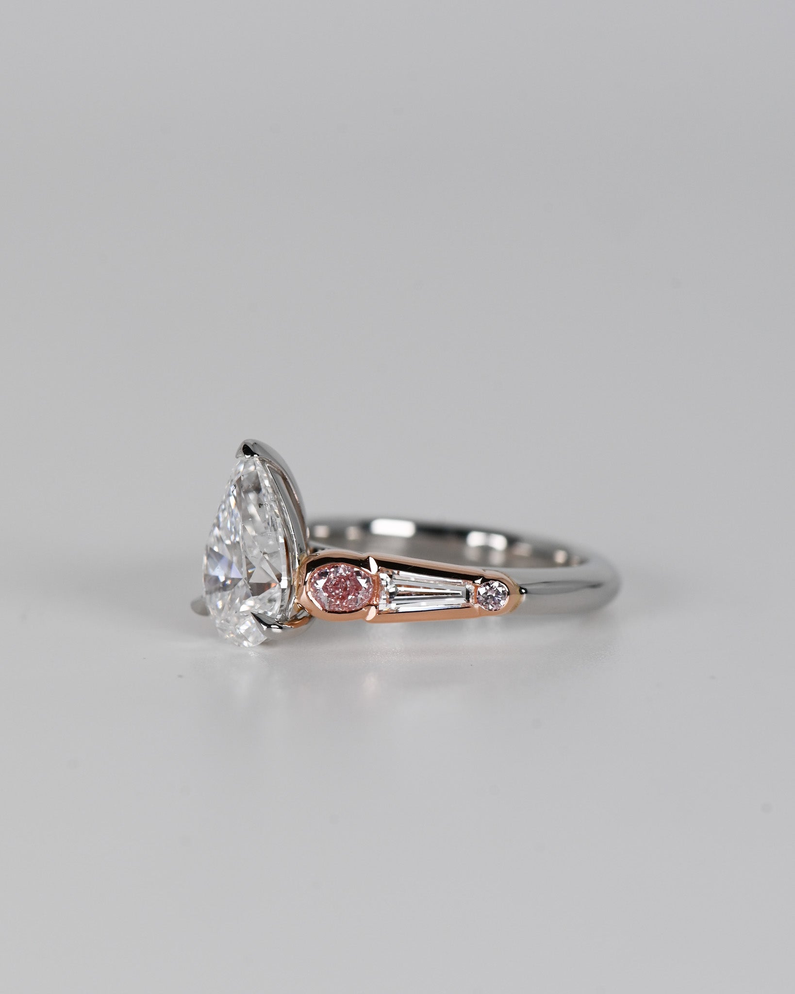 Pear Cut Diamond and Pink Diamond Ring