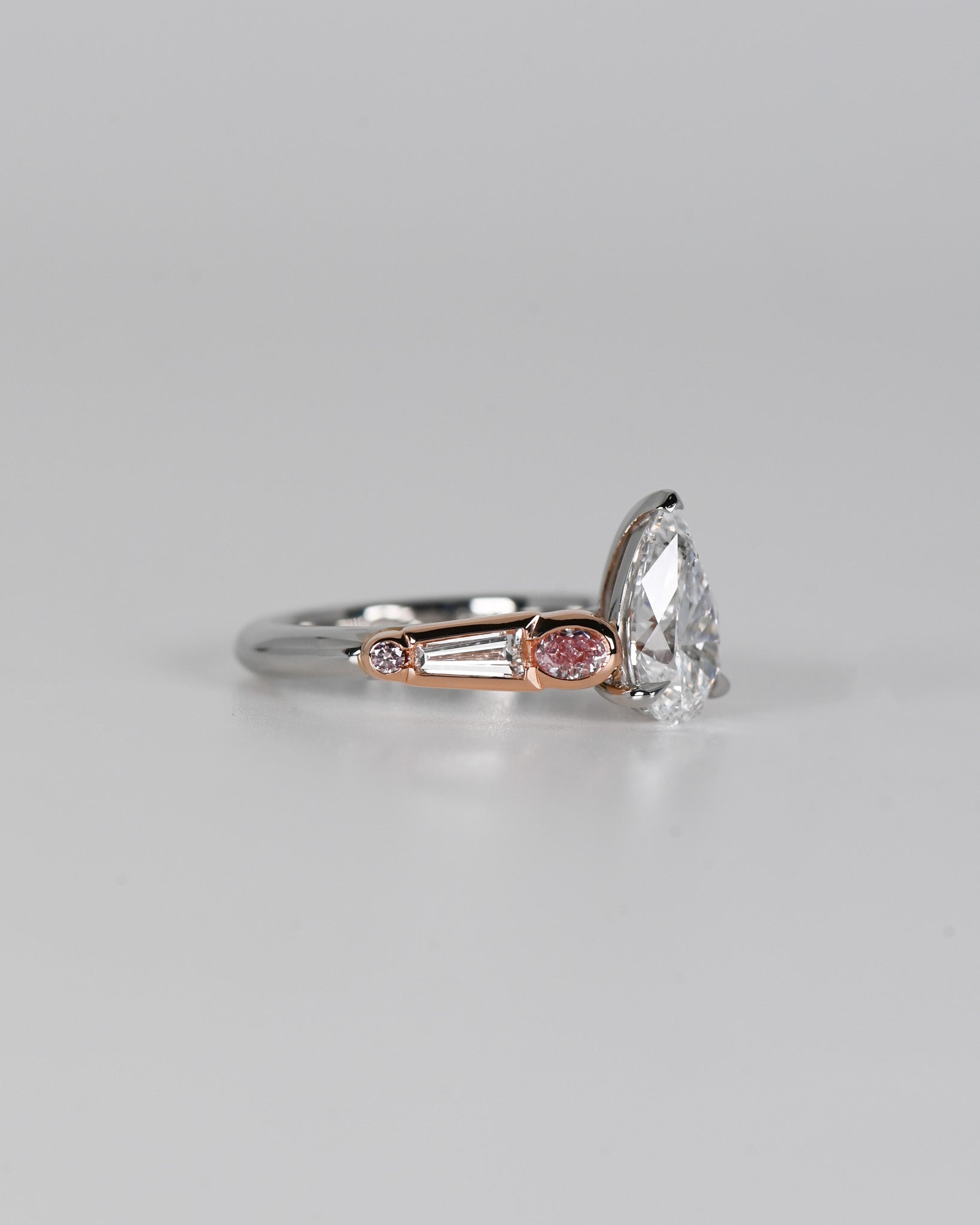 Pear Cut Diamond and Pink Diamond Ring