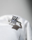 A.G 3.01ct radiant cut diamond engagement ring in satin ring box.