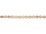 Close up of oval cut diamonds bezel set east-west in yellow gold.