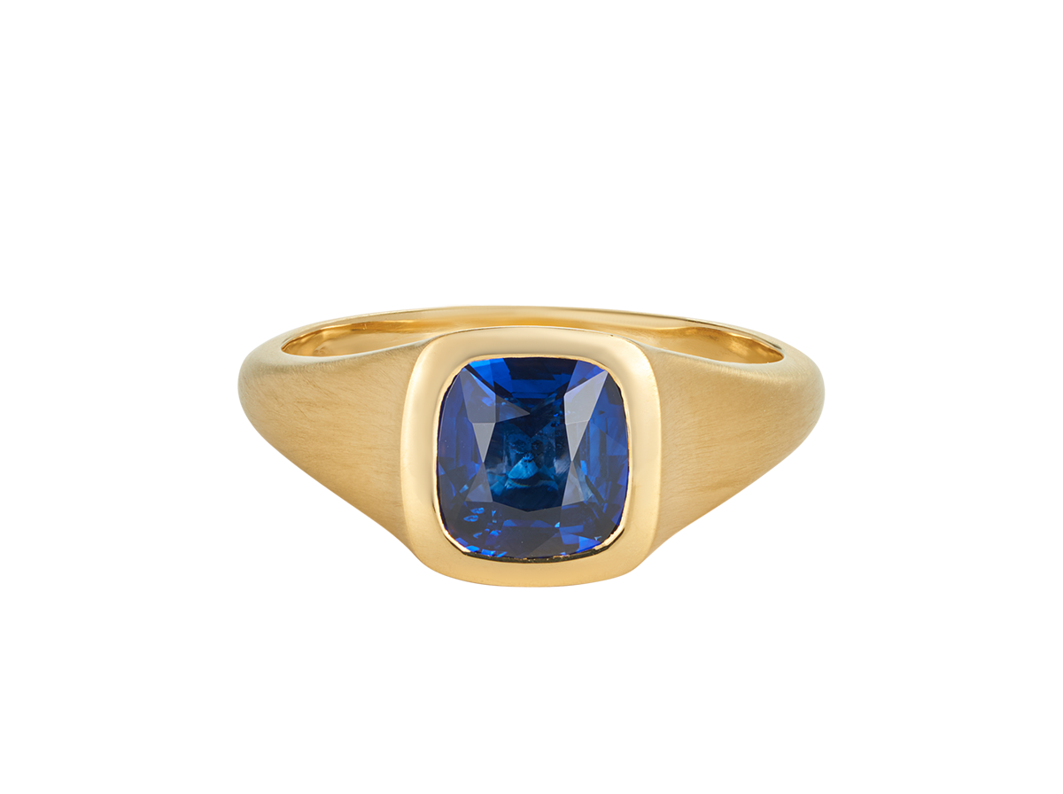 A.G Designer Jeweller custom designed men's signet ring with royal blue sapphire in yellow gold.