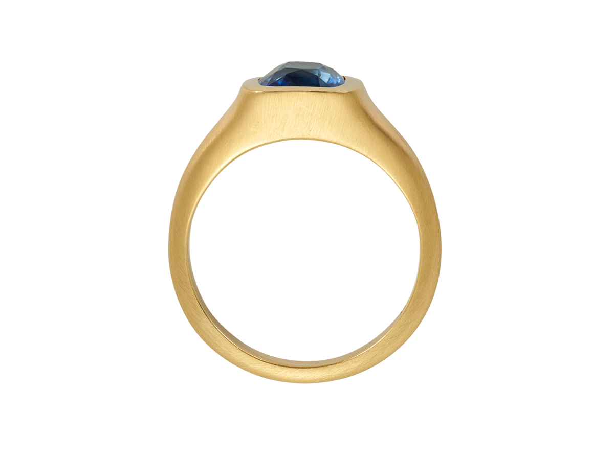 A.G Designer Jeweller custom designed men's signet ring with royal blue sapphire in yellow gold.