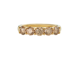 A.G 1.5ct round brilliant cut champagne diamond eternity band.