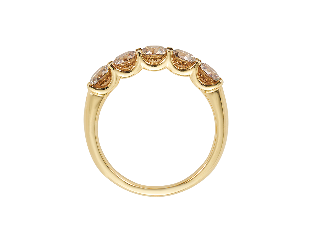 A.G 1.5ct round brilliant cut champagne diamond eternity band.