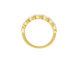 Front view of A.G Designer Jeweller custom made emerald cut diamond bezel set eternity band in yellow gold.