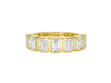A.G Designer Jeweller custom made emerald cut diamond bezel set eternity band in yellow gold.