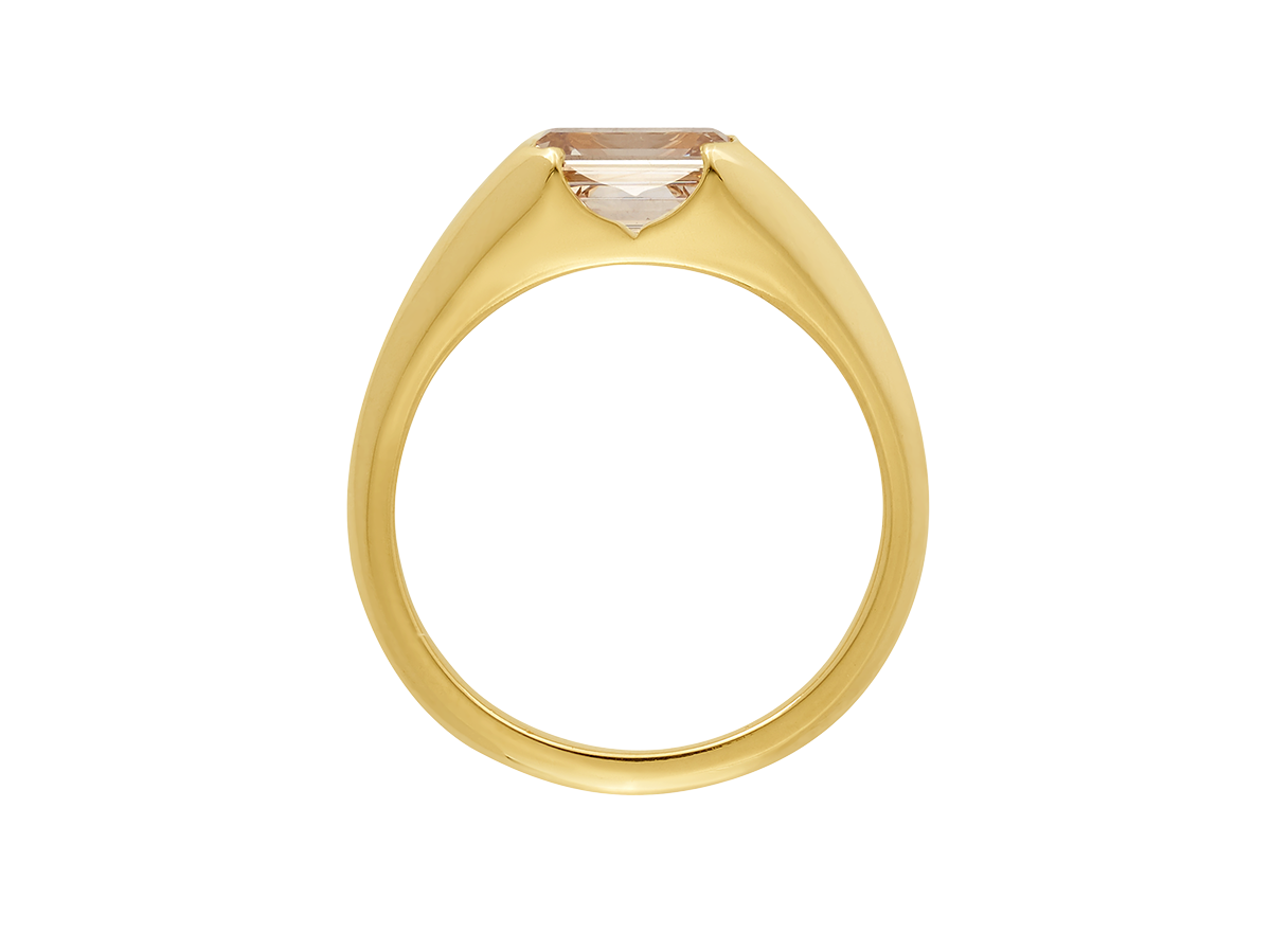 A.G custom signet ring with emerald cut champagne diamond in yellow gold.