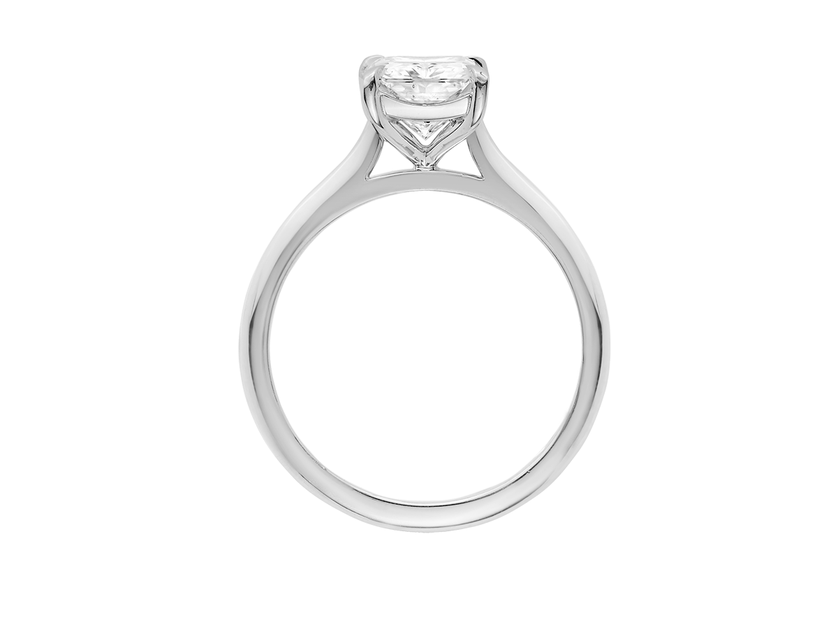A.G radiant cut diamond solitaire setting with a fine half round band.