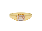 A.G custom signet ring with emerald cut champagne diamond in yellow gold.