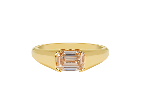 A.G custom signet ring with emerald cut champagne diamond in yellow gold.