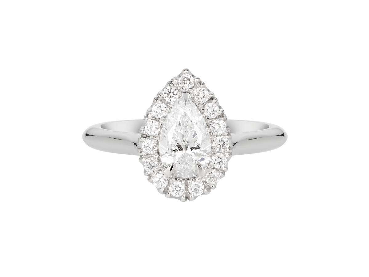 A.G pear cut diamond halo setting with half round band.
