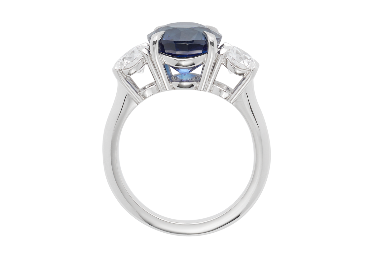 A.G round Royal Blue sapphire and diamond trilogy ring.