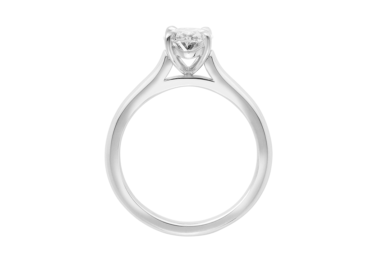 A.G oval cut diamond solitaire four claw setting with a half round band.