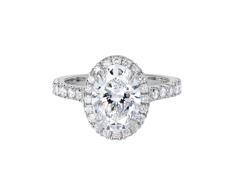A.G oval cut diamond halo setting with split bead half diamond band.