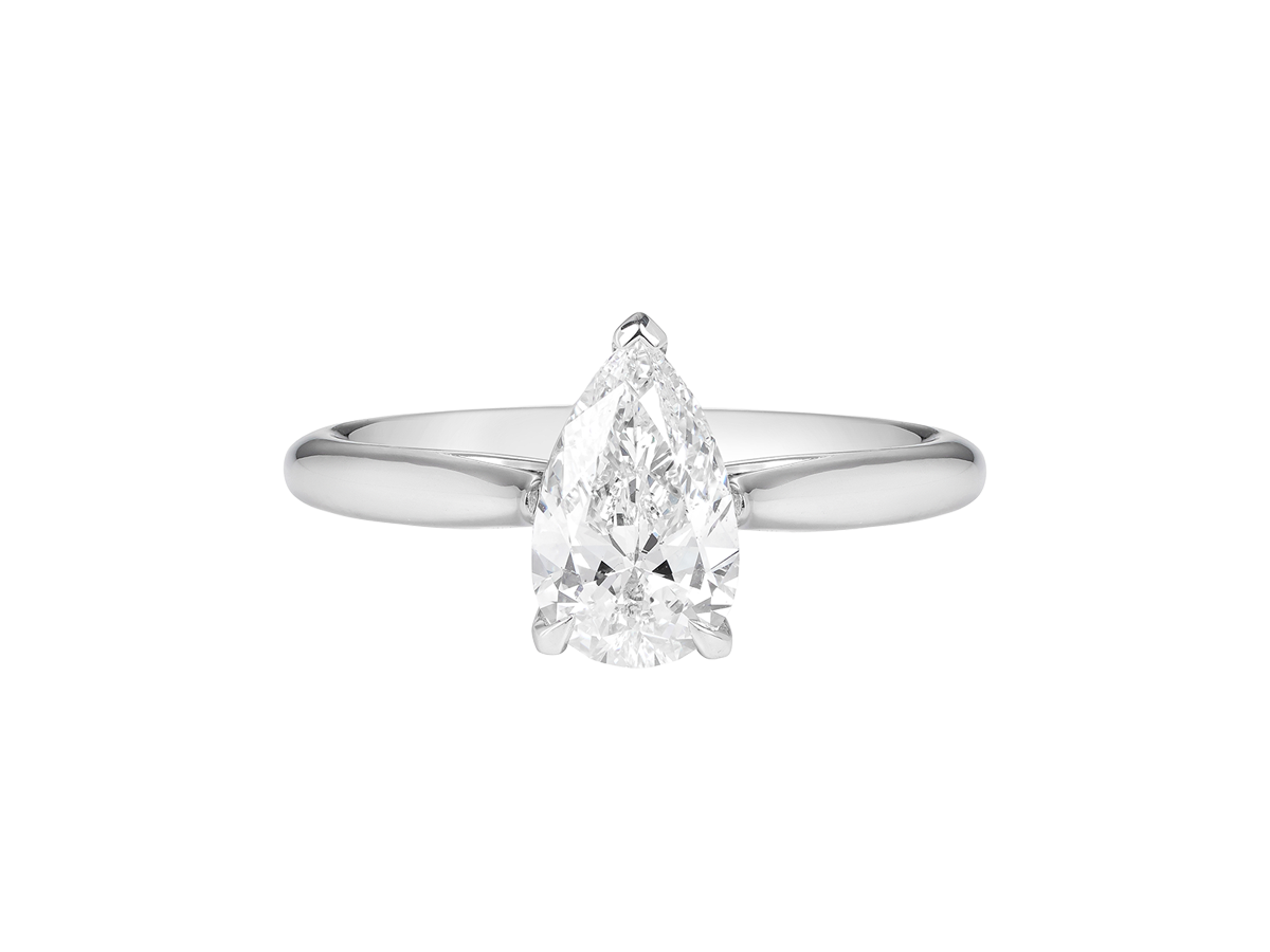 A.G pear cut diamond solitaire four claw setting with a half round band.