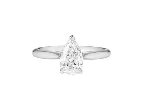A.G pear cut diamond solitaire four claw setting with a half round band.