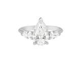 A.G pear cut diamond with pear cut side diamonds in a half round band.