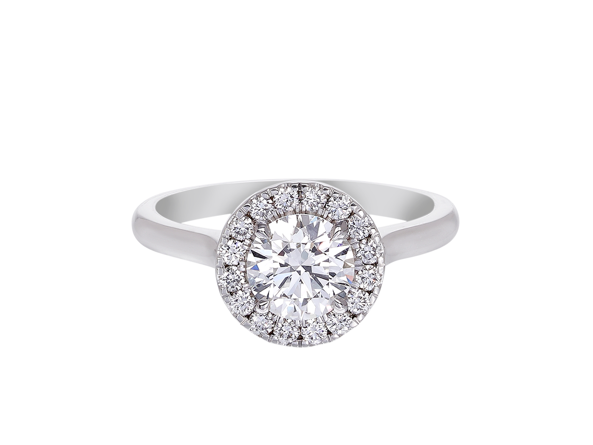 A.G round brilliant cut diamond halo setting with half round band.