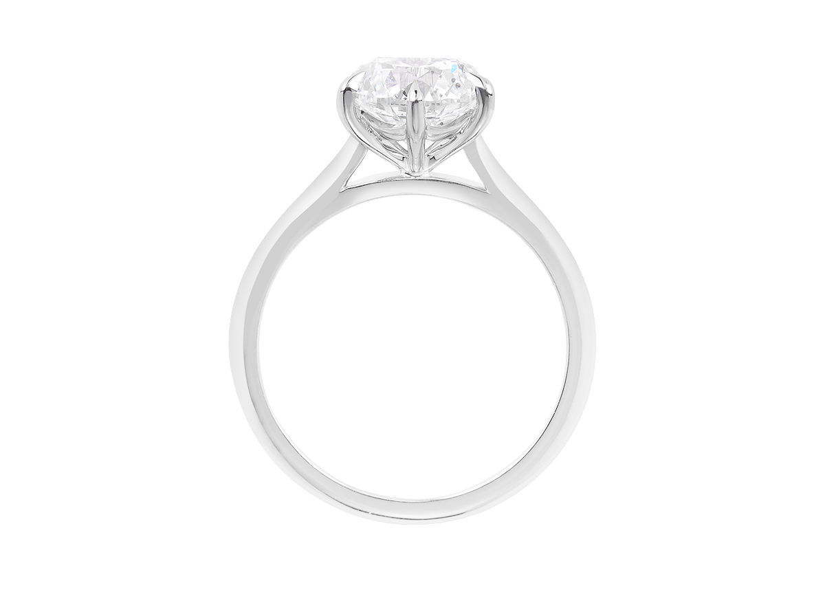 A.G round brilliant cut diamond six claw setting with swept up shoulders and a half round band.