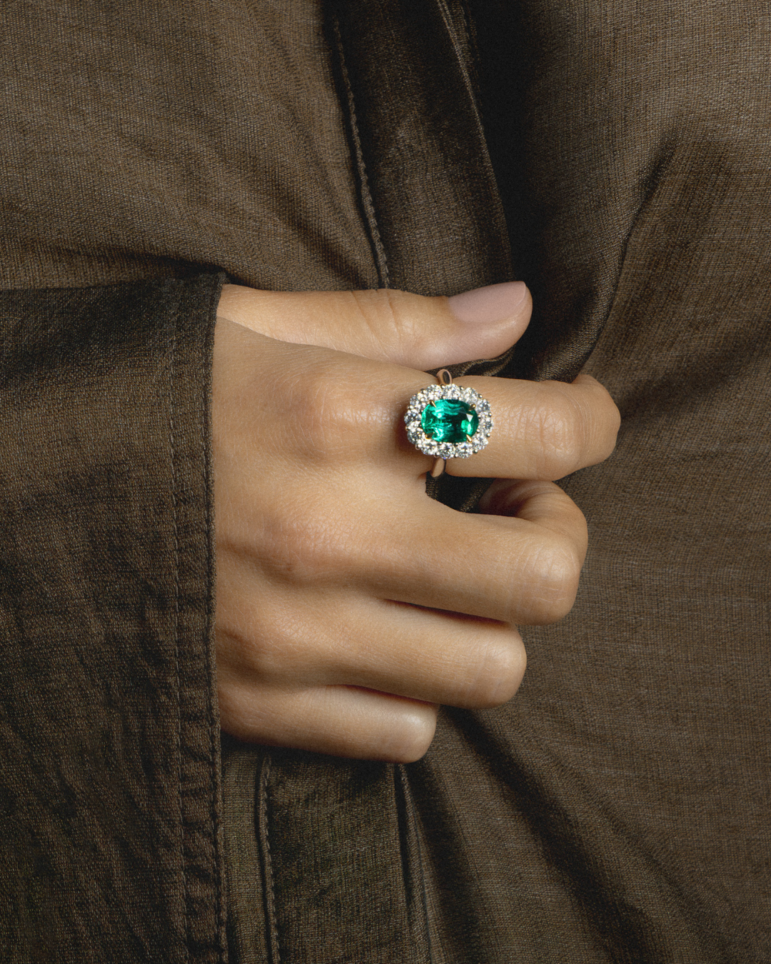 Oval Cut Emerald and Diamond Cluster Ring