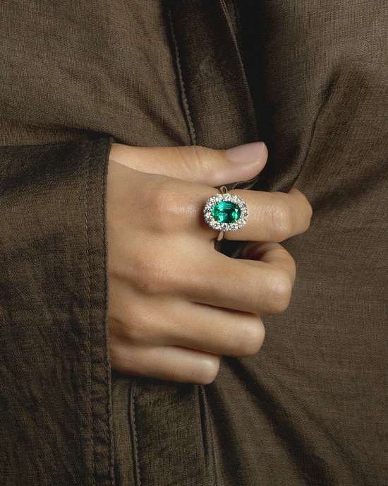 Oval Cut Emerald and Diamond Cluster Ring