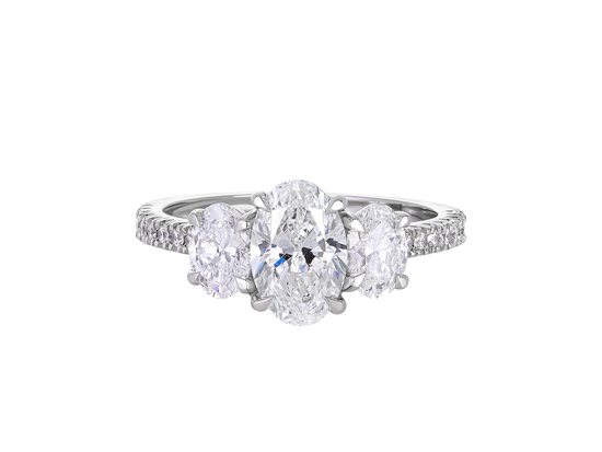 A.G oval cut trilogy with split bead diamond band.