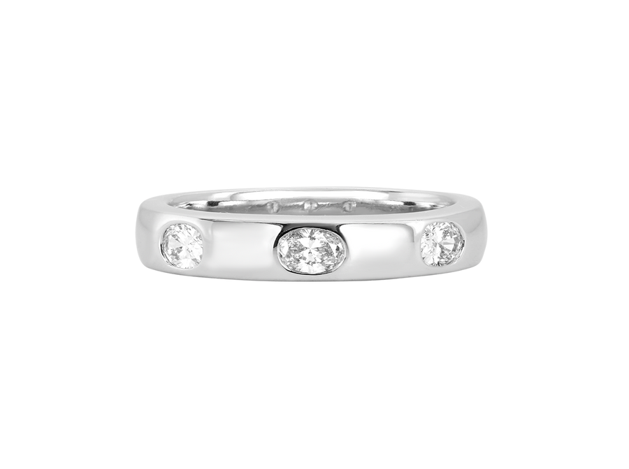 A.G Designer Jeweller signature custom designed hammer set oval cut diamond wedding ring.