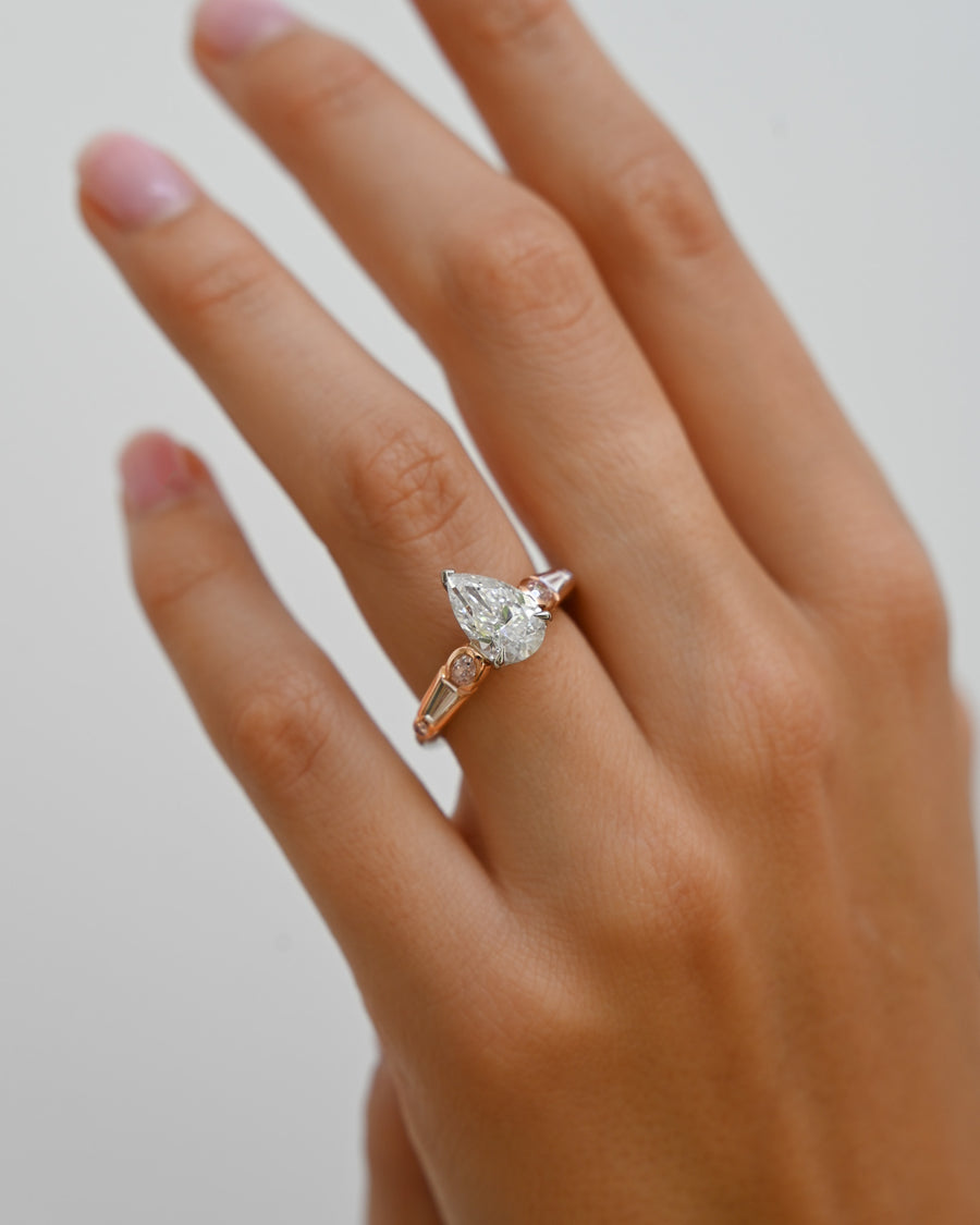Pear Cut Diamond and Pink Diamond Engagement Ring