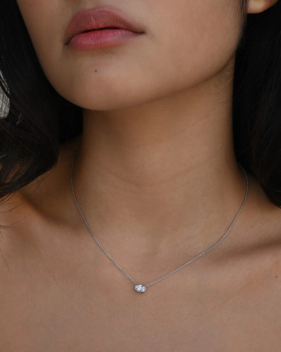 East-West Oval Cut Diamond Pendant Necklace in 18ct Gold