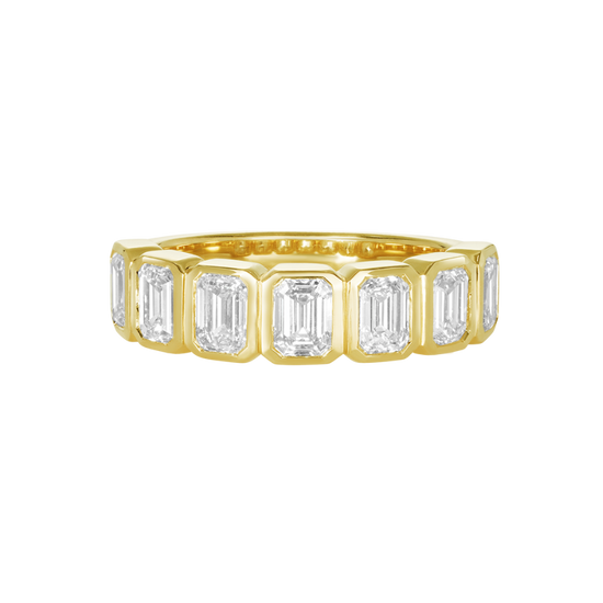 A.G Designer Jeweller custom made emerald cut diamond bezel set eternity band in yellow gold. 