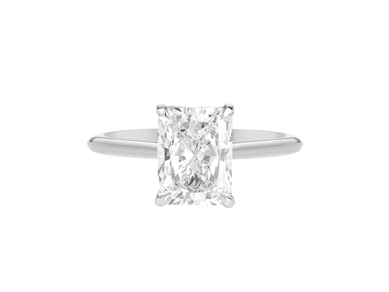 A.G radiant cut diamond solitaire setting with a fine half round band.