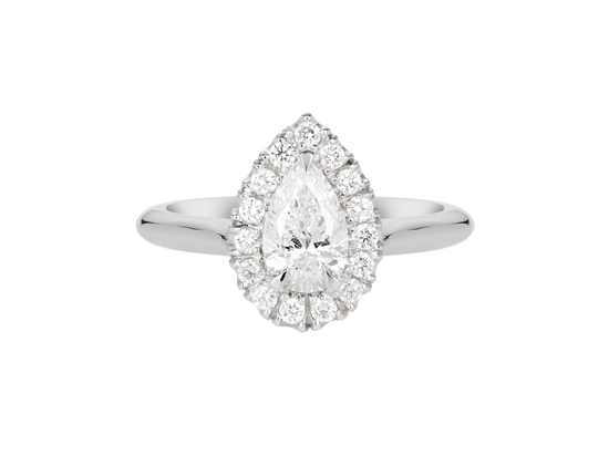 A.G pear cut diamond halo setting with half round band. 