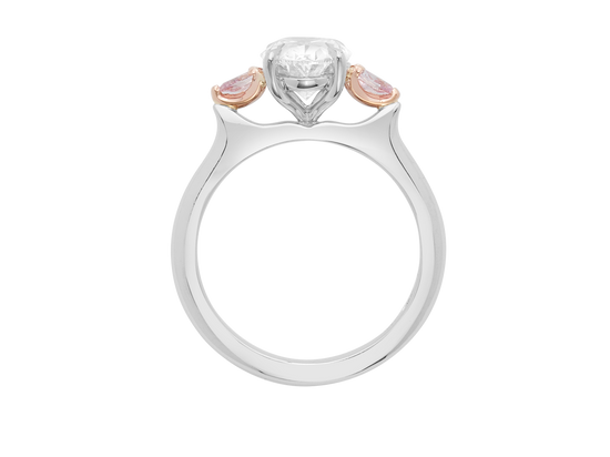 A.G oval cut diamond with pear cut side diamonds in a half round band.