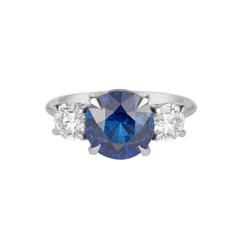 A.G round Royal Blue sapphire and diamond trilogy ring.