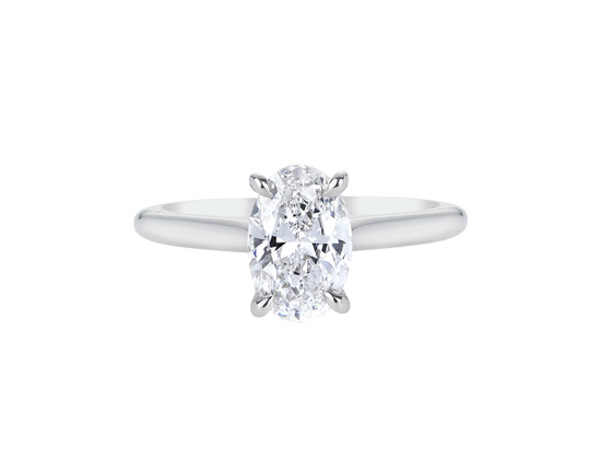 A.G oval cut diamond solitaire four claw setting with a half round band.