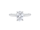 A.G oval cut diamond solitaire four claw setting with a half round band.